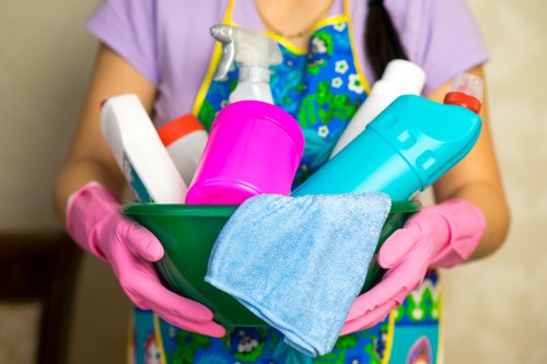 Professional carpet cleaners handling a stained carpet in a busy Soho property